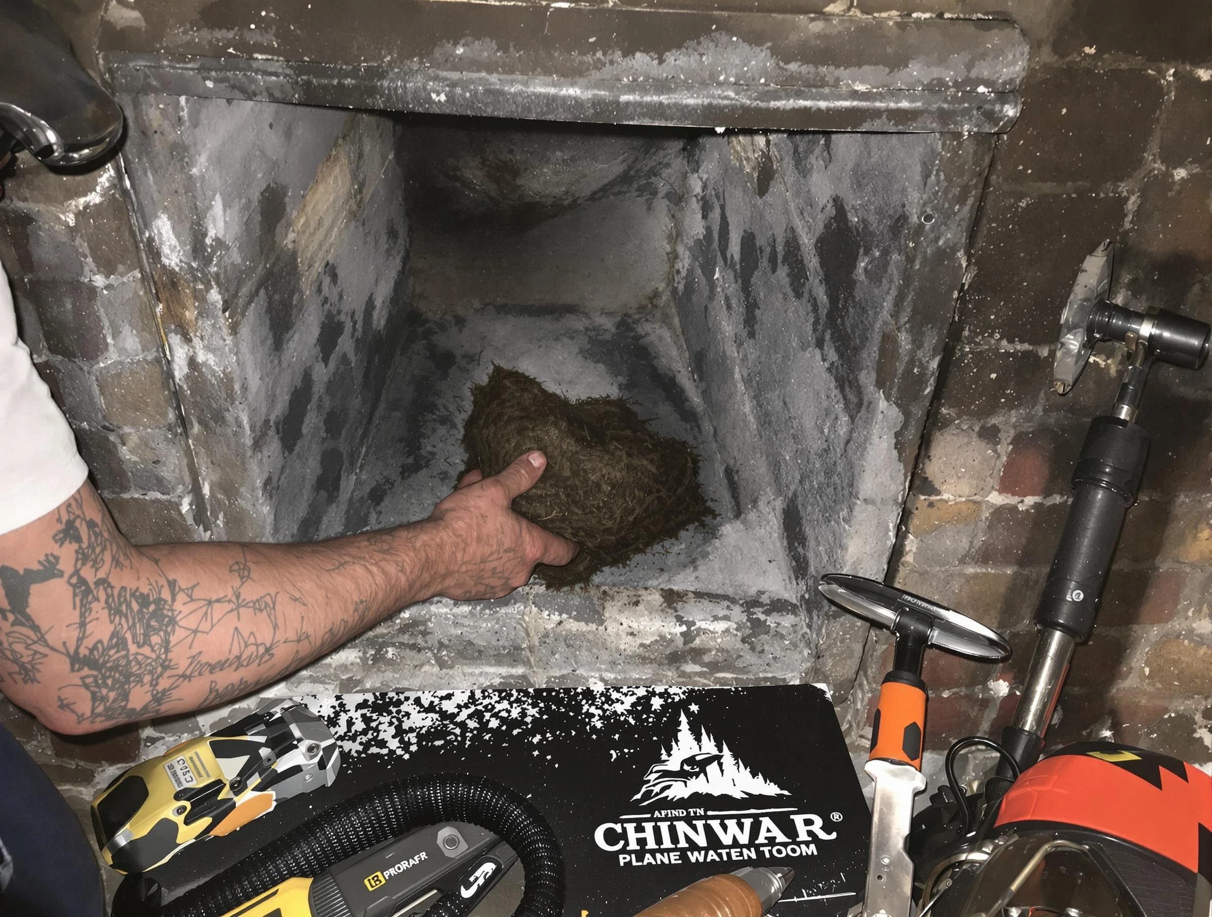 Woods Cross Chimney Sweep safely removing debris and screening chimney in Woods Cross, UT