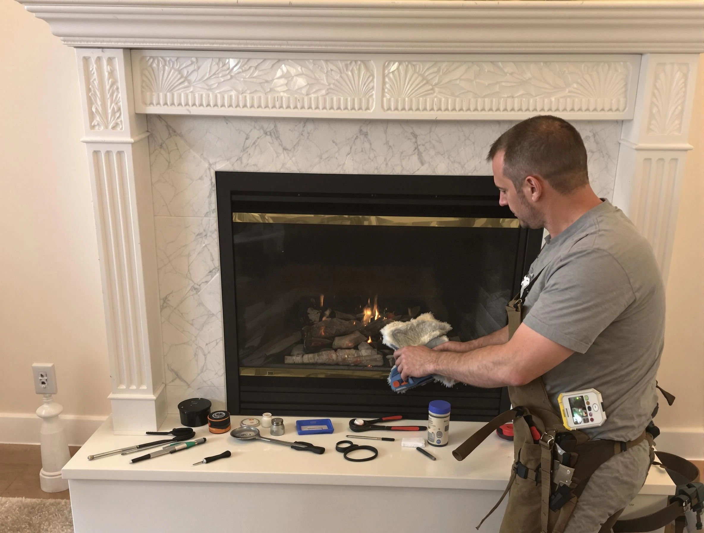 Woods Cross Chimney Sweep performing fireplace maintenance in Woods Cross, UT